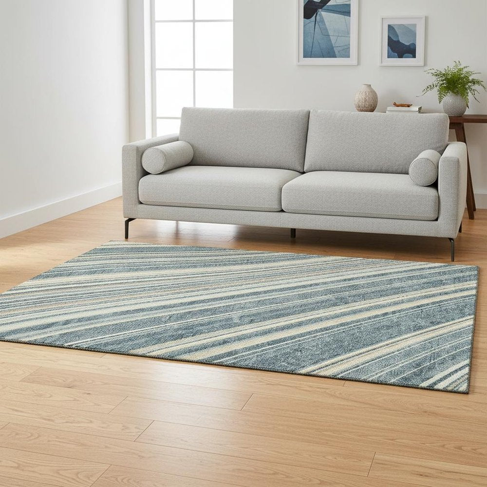 5' X 8' Sky Blue Tan And Beige Striped Washable Area Rug With UV Protection
