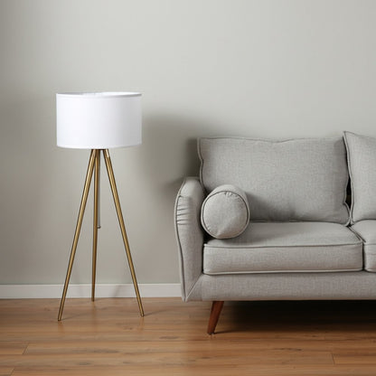 Gold Metal Adjustable Tripod Floor Lamp With White Linen Drum Shade