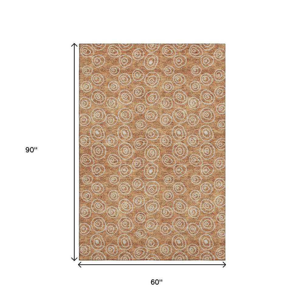 5' X 8' Terra Cotta And Beige Polka Dot Washable Area Rug With UV Protection