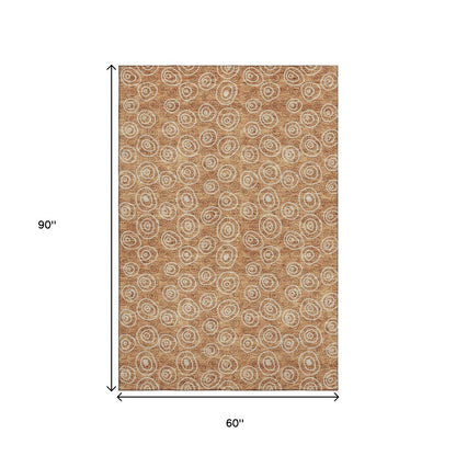 5' X 8' Terra Cotta And Beige Polka Dot Washable Area Rug With UV Protection