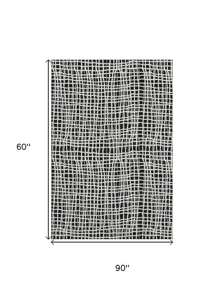 5' X 8' Black And Ivory Striped Washable Area Rug With UV Protection