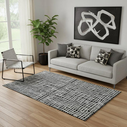 5' X 8' Black And Ivory Striped Washable Area Rug With UV Protection