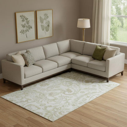 8' X 10' Beige And Ivory Paisley Washable Area Rug With UV Protection