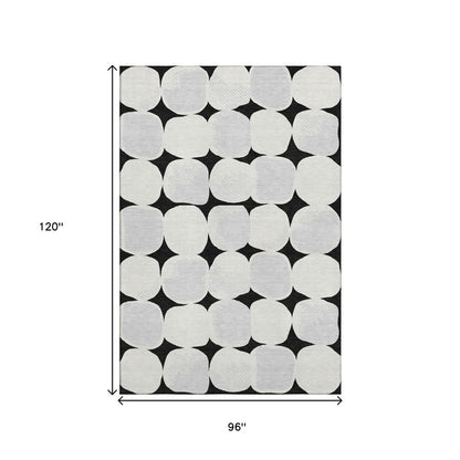 8' X 10' Black And Ivory Abstract Geometric Washable Area Rug With UV Protection
