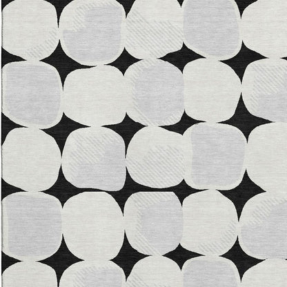8' X 10' Black And Ivory Abstract Geometric Washable Area Rug With UV Protection