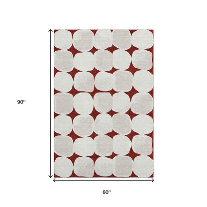 5' X 8' Burgundy And Ivory Abstract Geometric Washable Area Rug With UV Protection