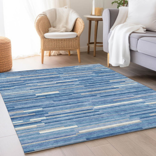 5' X 8' Sky Blue Ivory And Gray Striped Washable Area Rug With UV Protection