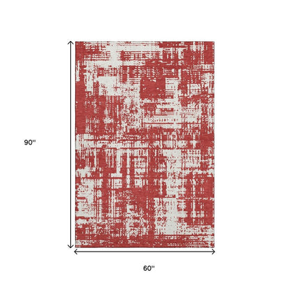 5' X 8' Red And Ivory Abstract Washable Area Rug With UV Protection