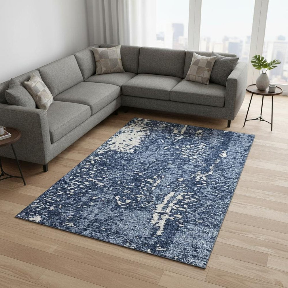 8' X 10' Denim Blue And Ivory Abstract Washable Area Rug With UV Protection