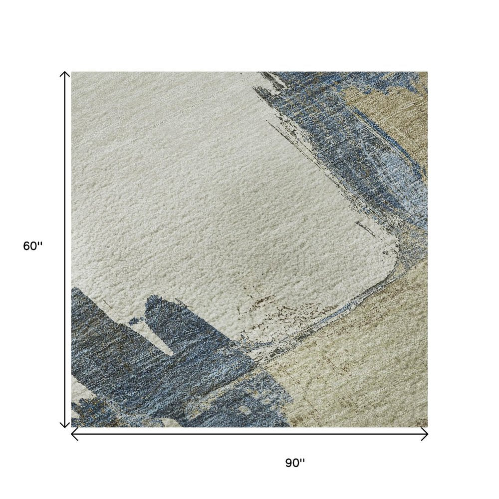 5' X 8' Beige Blue And Ivory Abstract Washable Area Rug With UV Protection