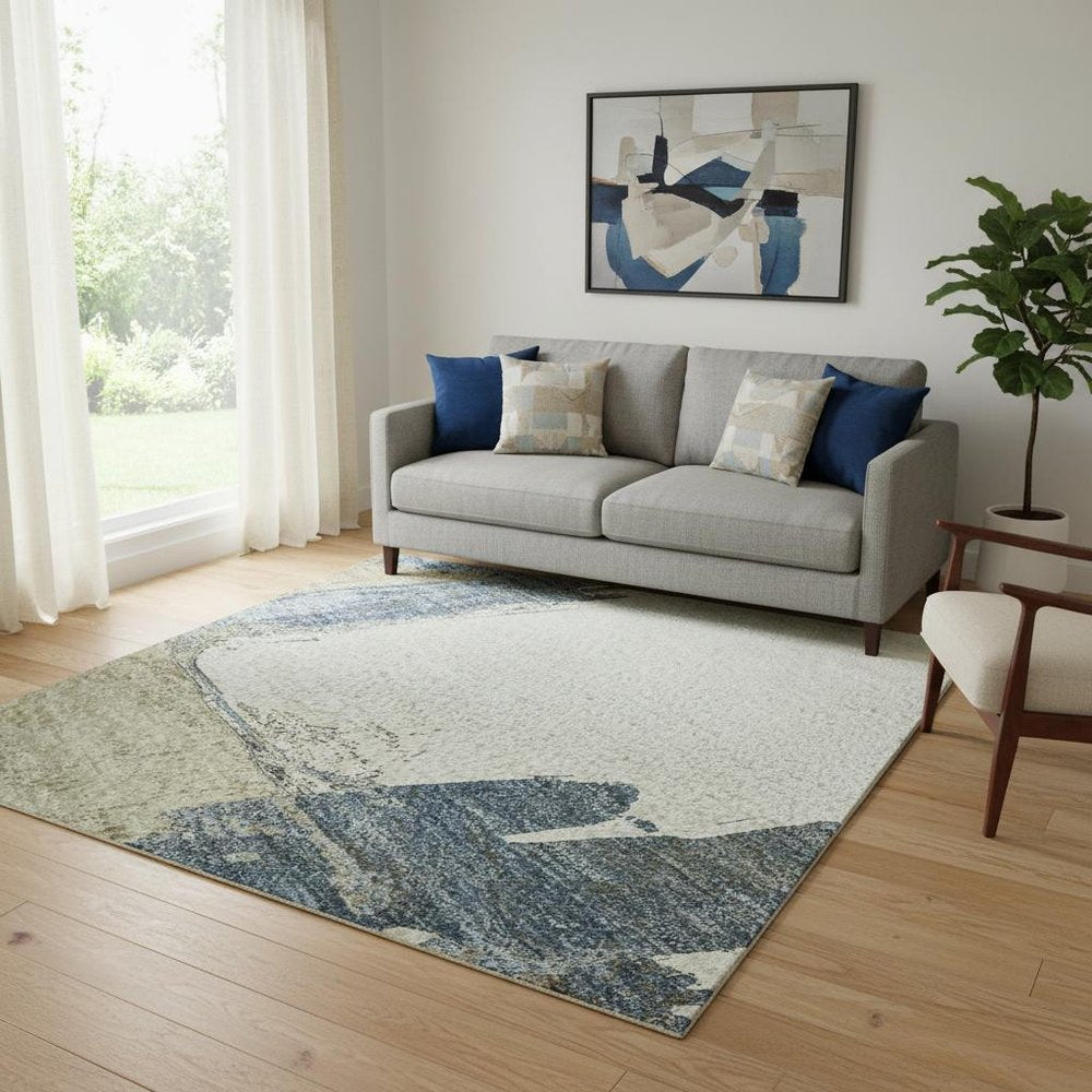 5' X 8' Beige Blue And Ivory Abstract Washable Area Rug With UV Protection