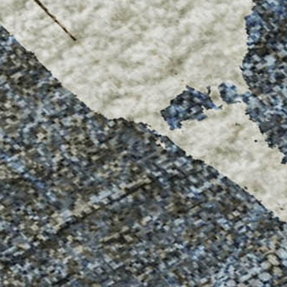 5' X 8' Beige Blue And Ivory Abstract Washable Area Rug With UV Protection