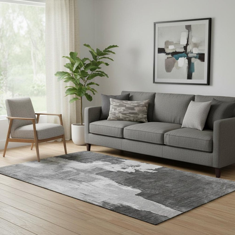 5' X 8' Gray Silver And Charcoal Abstract Washable Area Rug With UV Protection