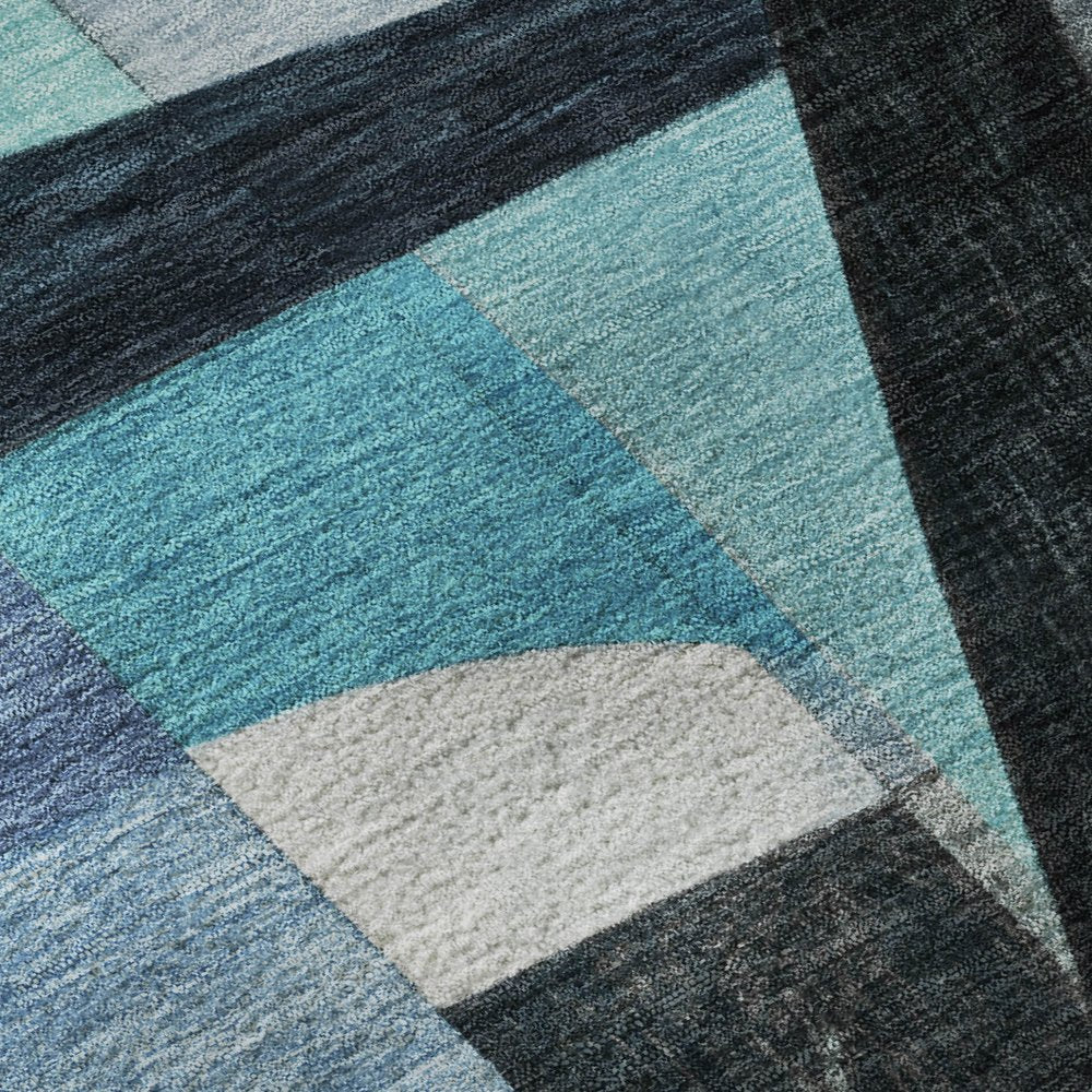 8' X 10' Teal Black And Blue Abstract Washable Area Rug With UV Protection