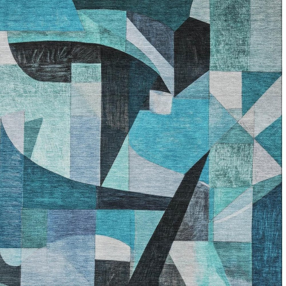 8' X 10' Teal Black And Blue Abstract Washable Area Rug With UV Protection
